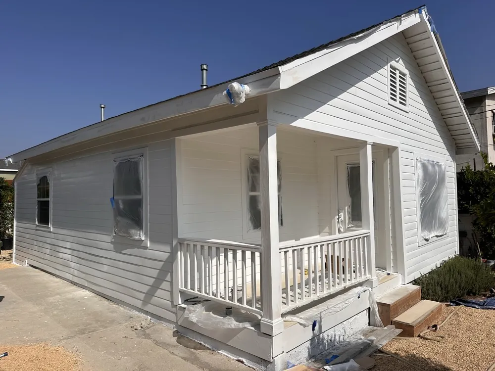 Front porch during painting, masked and primed